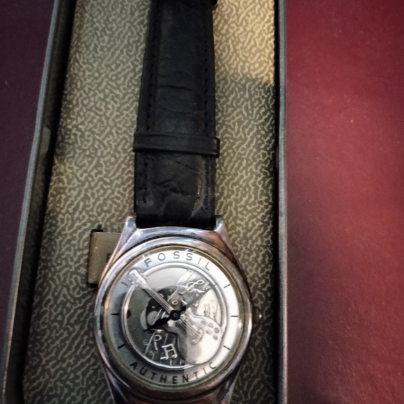 1992 Fossil guitar  watch a few scratches on back. Front face is great. No blems - Picture 2 of 5